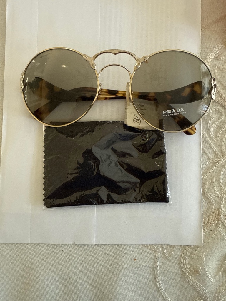 Prada Gold Frame Round Sunglasses With Tortoiseshell Temples And Gray Lenses